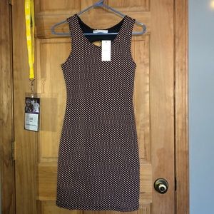 A tight polka dot dress